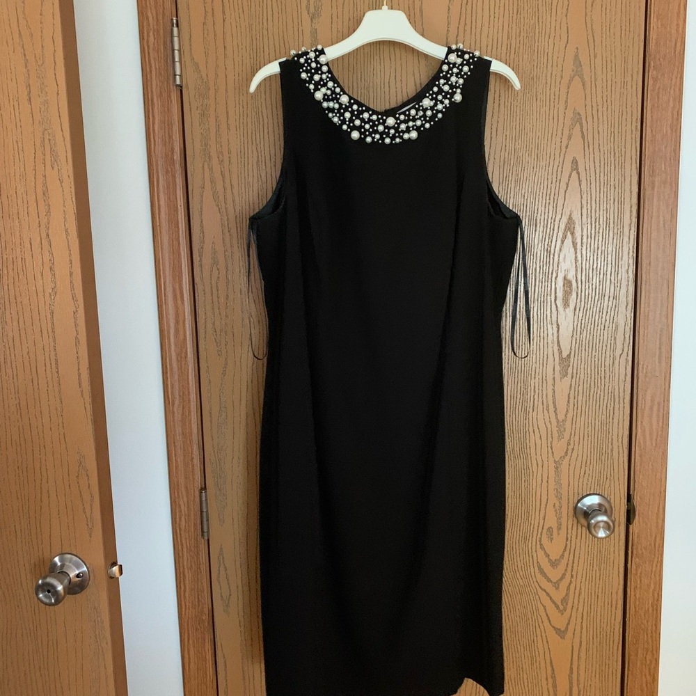 Calvin Klein black dress. Pearl embellishment around the top.
